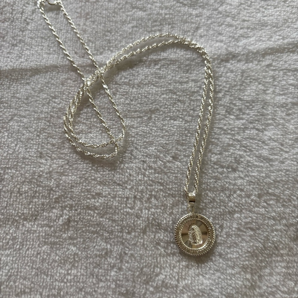Elegant Silver Pendant Necklace With Virgin Mary Image